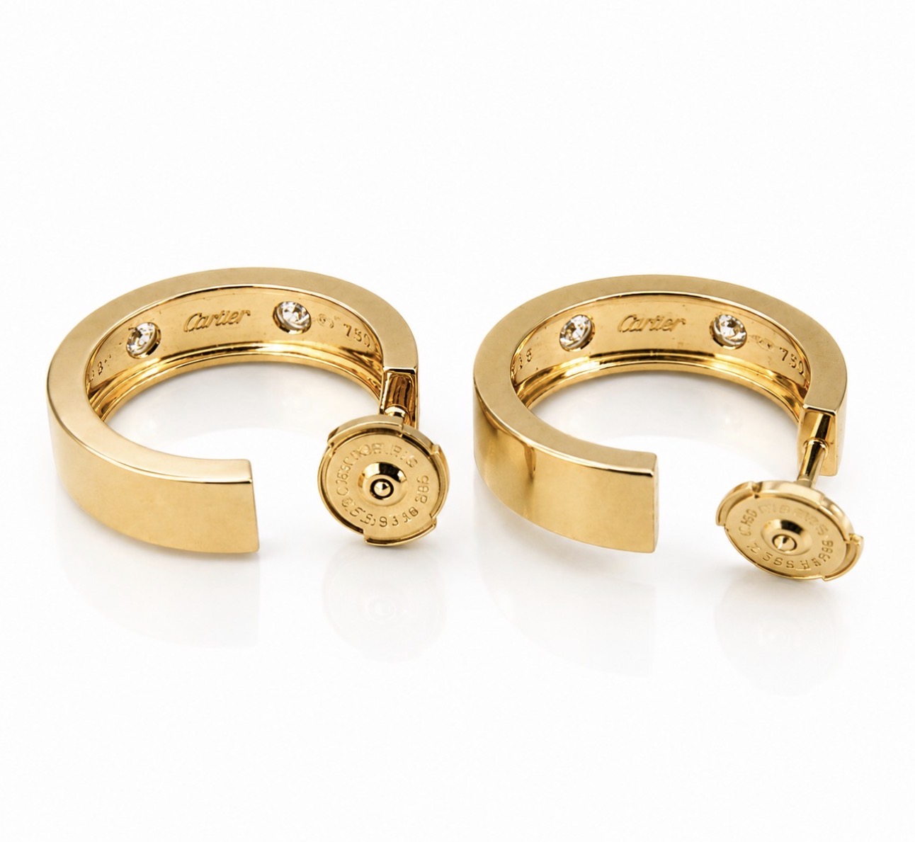 Brylantowe kolczyki Cartier 5