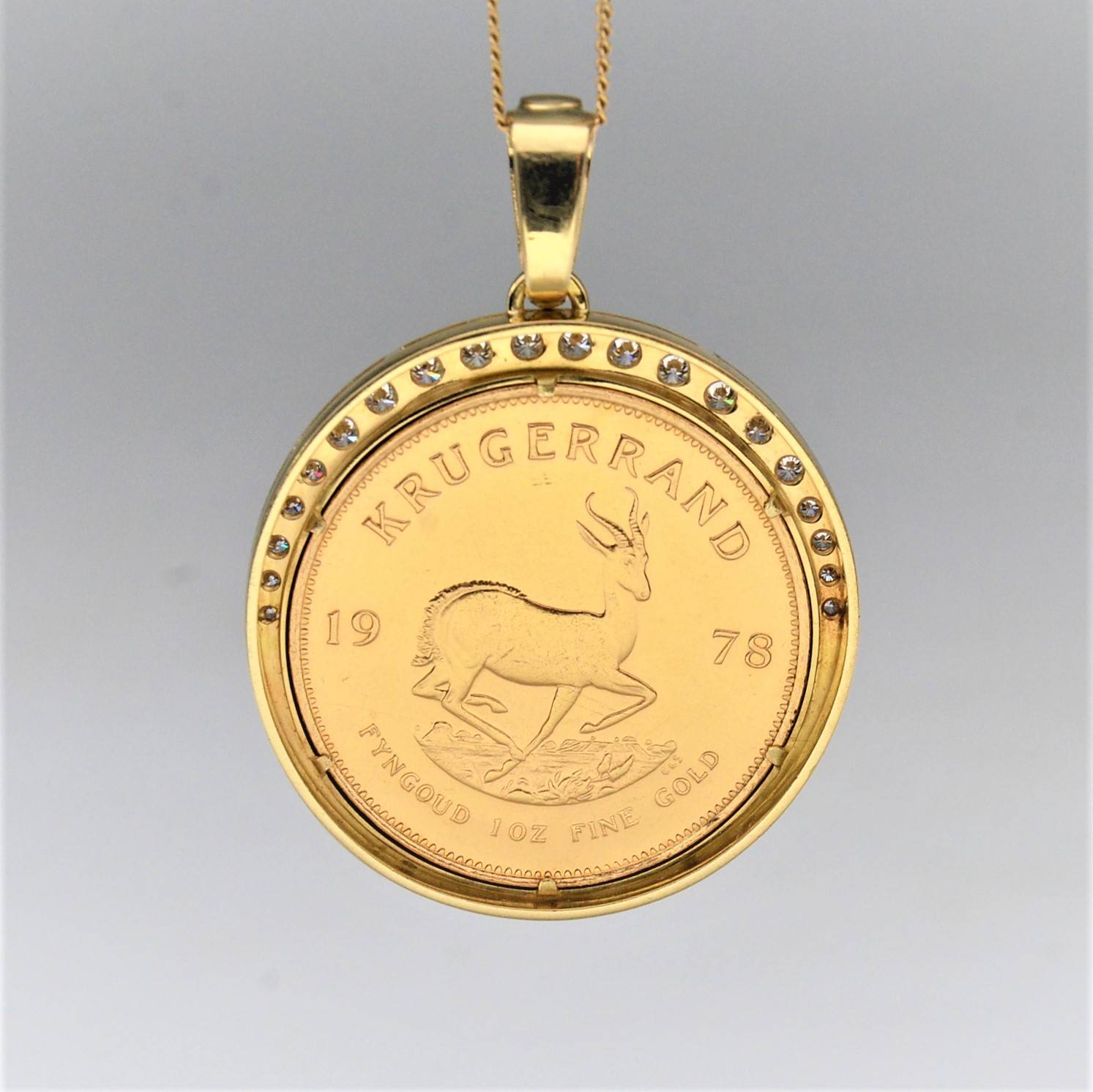 Medalion z osadzonym złotym Krugerrandem 0