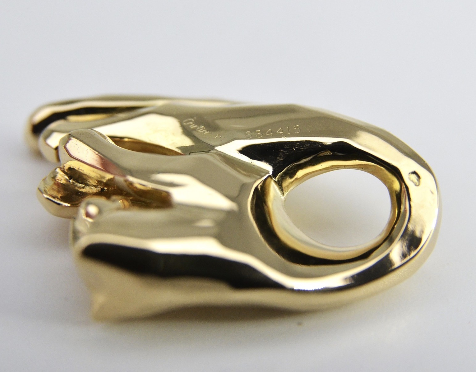 Złota zawieszka Panthère de Cartier 4