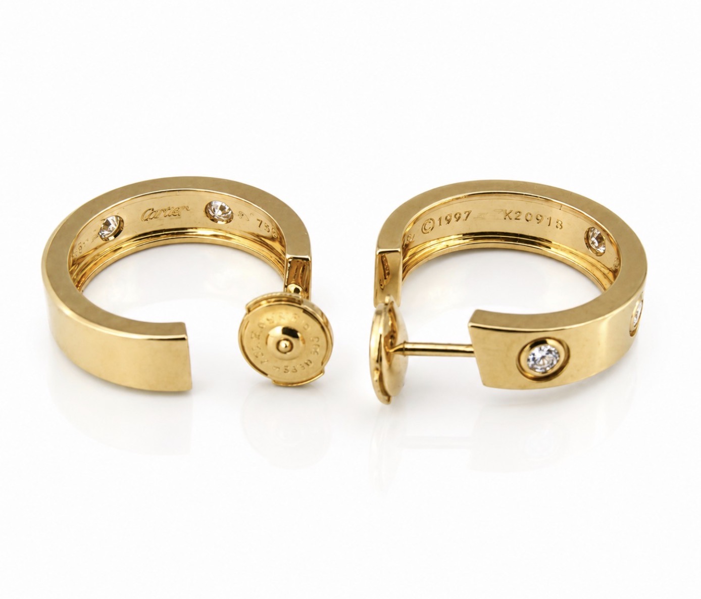 Brylantowe kolczyki Cartier 4