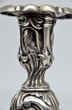 A pair of silver candlesticks 3