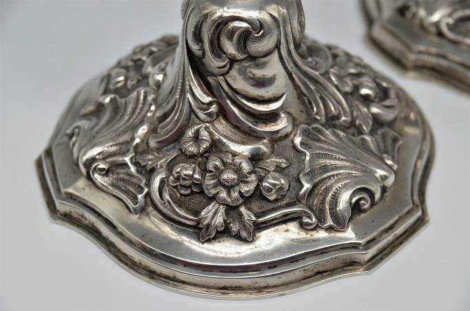 A pair of silver candlesticks 1