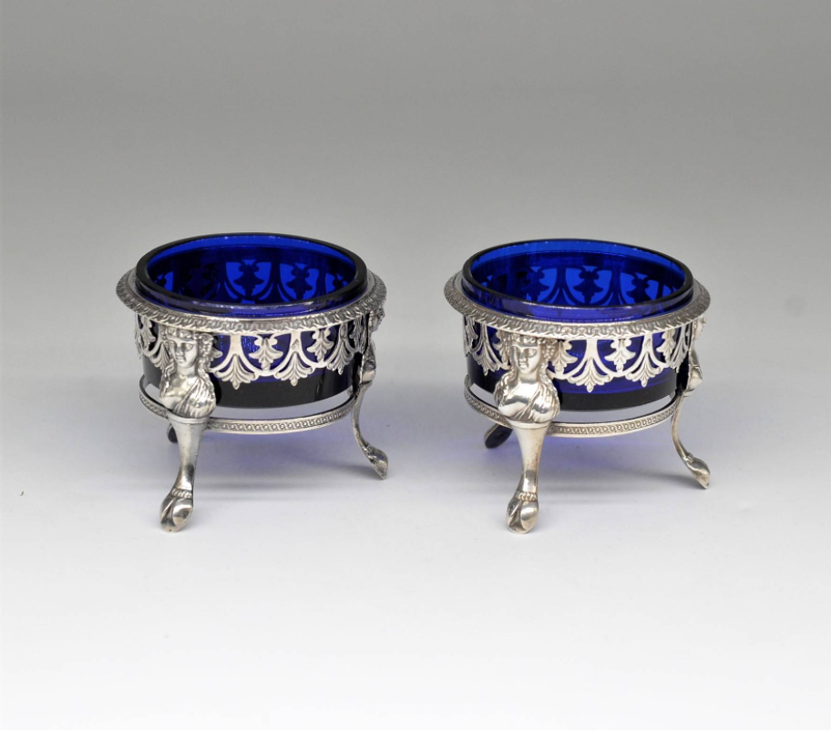 A pair of spice dishes