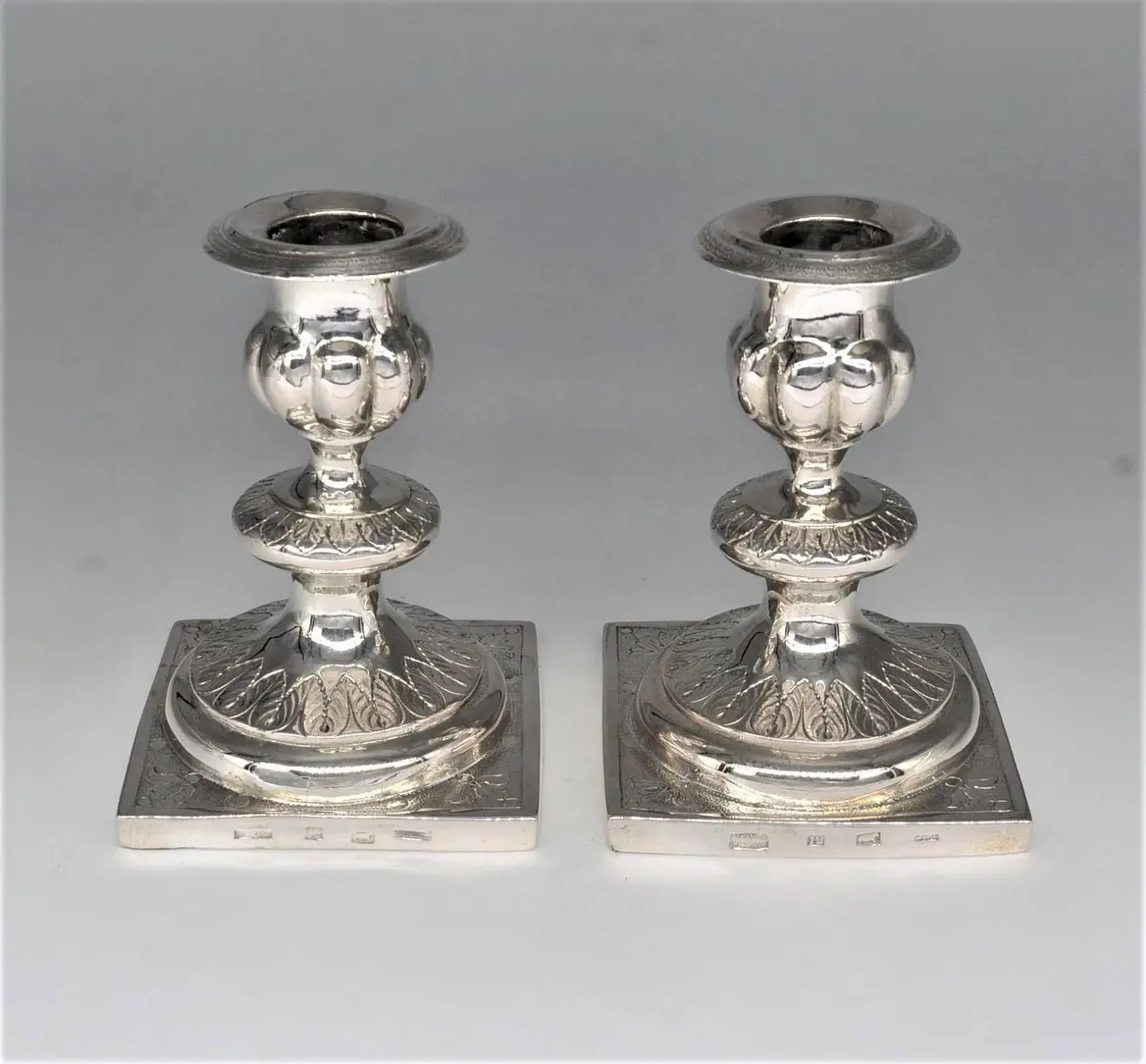 Pair of silver candlesticks
