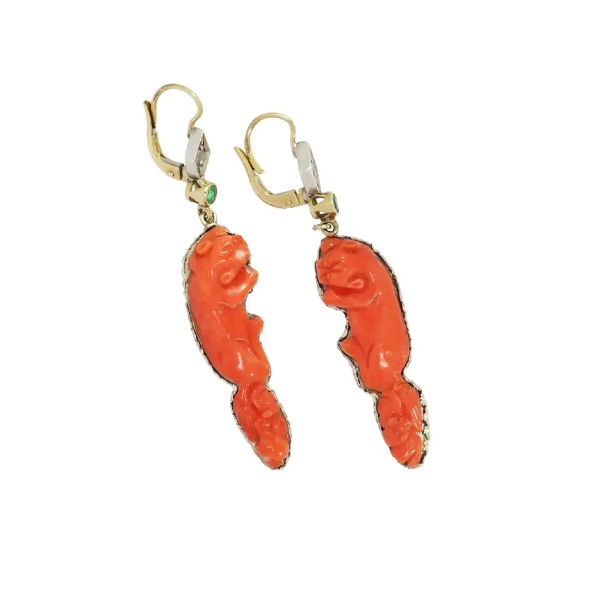 Carved coral earrings with squirrel and bat motif