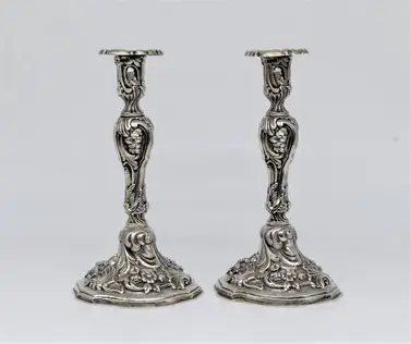 A pair of silver candlesticks